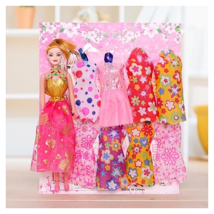 Кукла модель Оля с набором платьев  