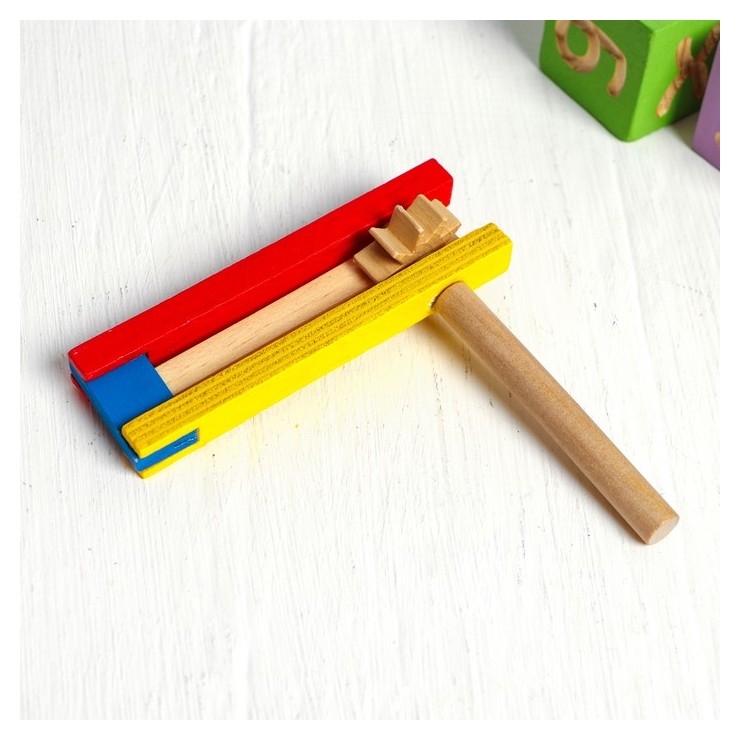 Музыкальная игрушка «Трещотка» 2.5×10.5×11.5 см