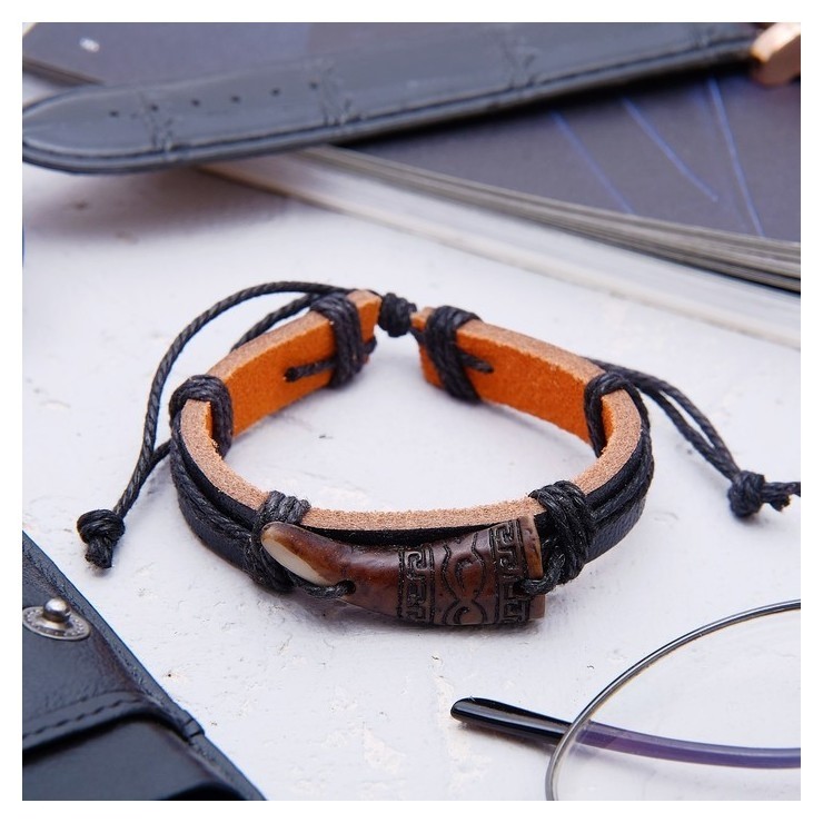 

Браслет унисекс "Клык", цвет чёрно-коричневый ,d=7d, Чёрный