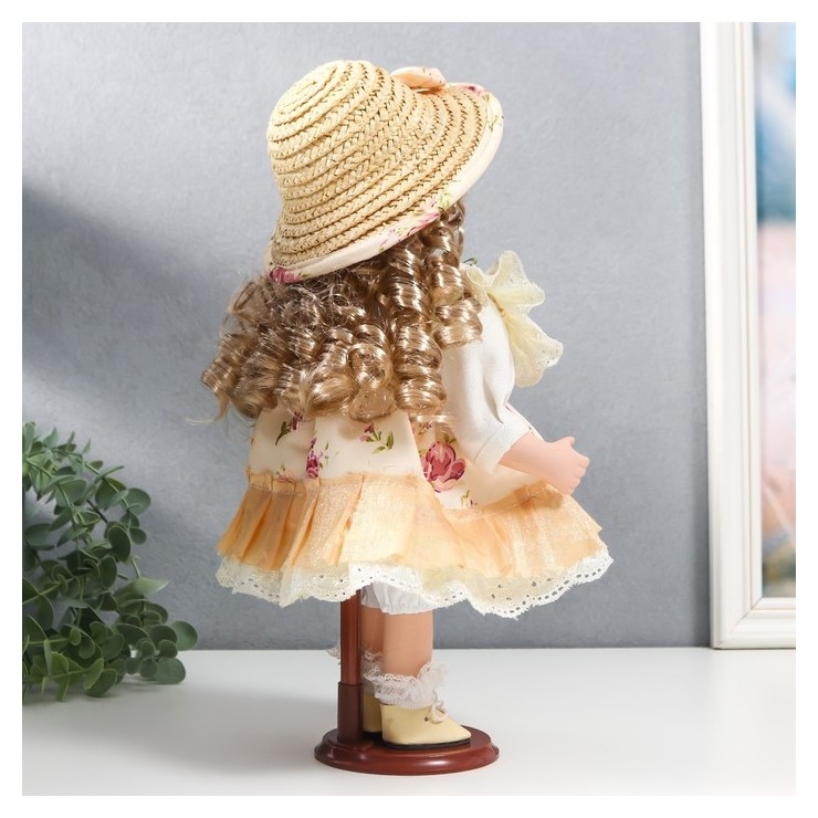 Кукла коллекционная керамика Алиса в жёлтом платье с цветами, в соломенной шляпке 30 см